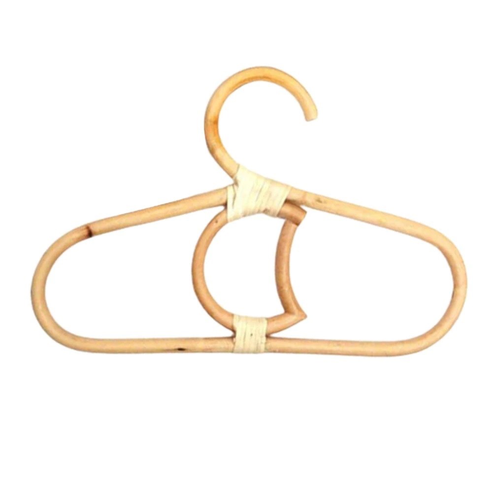 Kids' clothes hanger hand woven in natural rattan in a moon shape