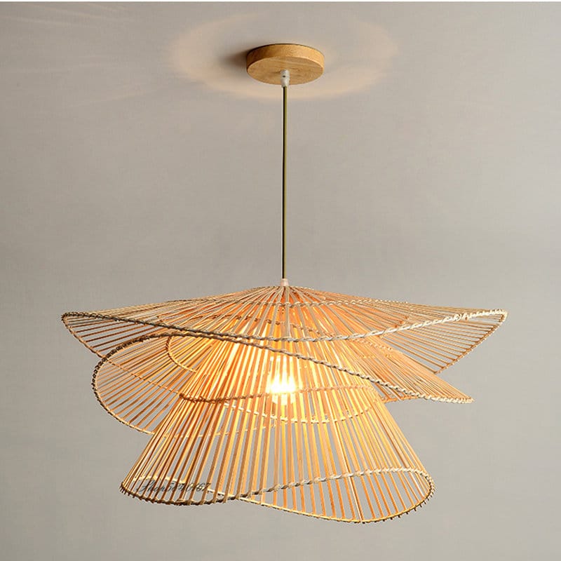 Sculptural pendant made of twisted stacked rattan rings