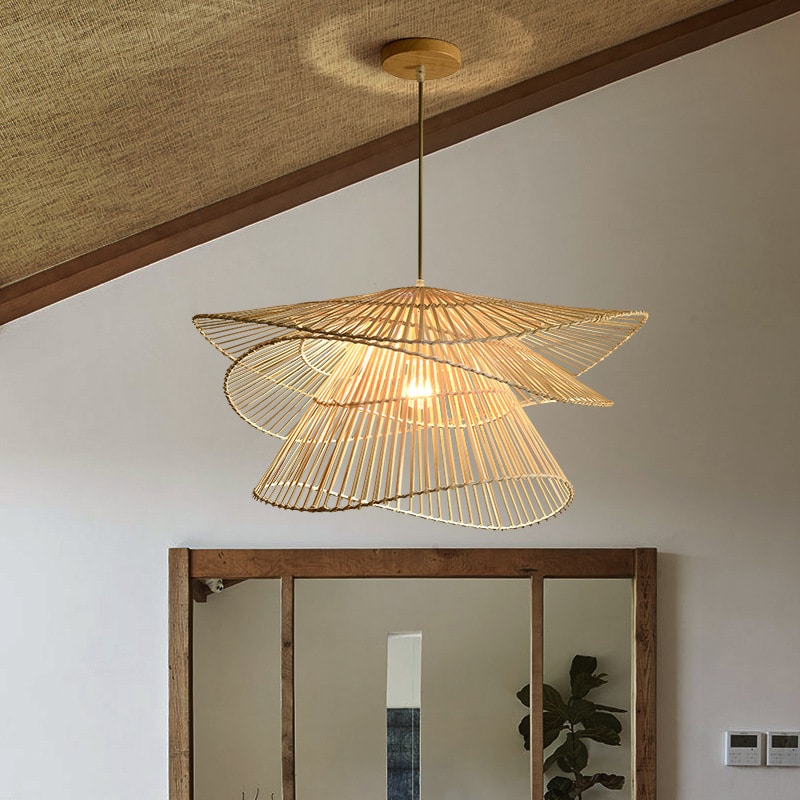 Sculptural pendant made of twisted stacked rattan rings