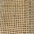 Roll of natural open weave rattan cane webbing