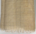 Roll of natural open weave rattan cane webbing