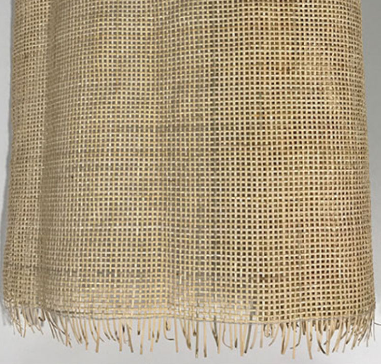 Roll of natural open weave rattan cane webbing