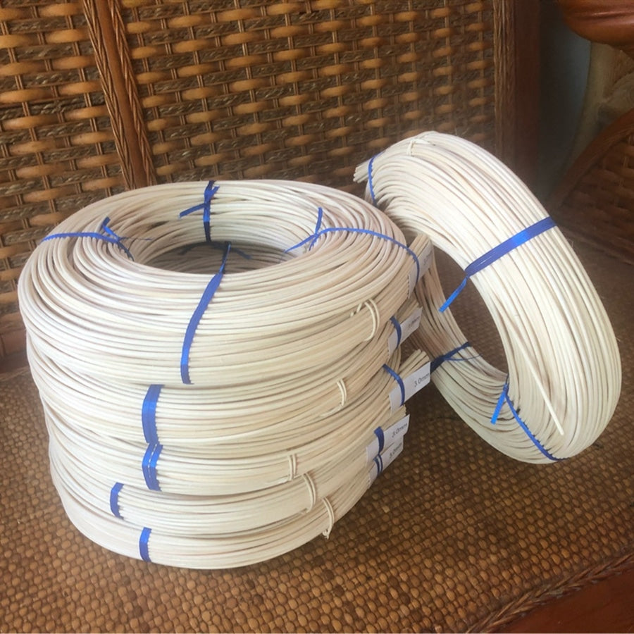 Coil of natural rattan reed core for caning and basketry