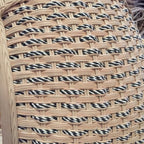 Coil of natural rattan reed core for caning and basketry