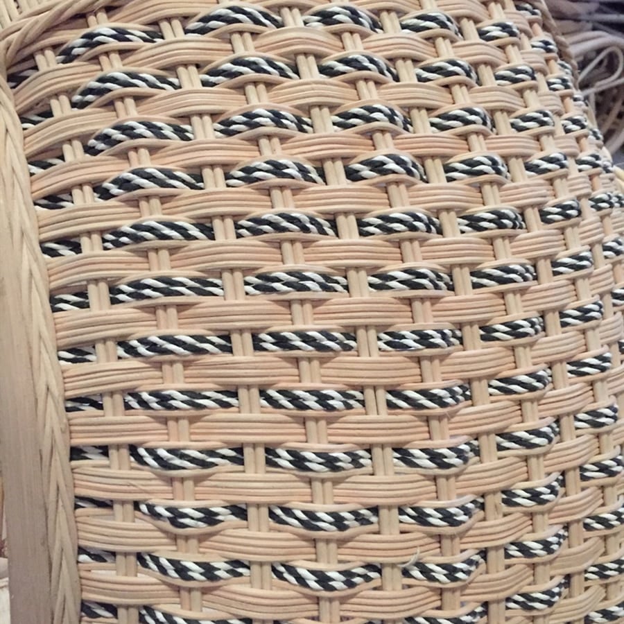 Coil of natural rattan reed core for caning and basketry