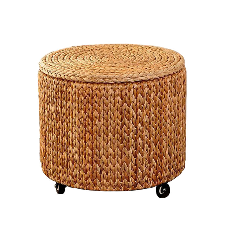 Round natural hand woven footstool on casters with a woven lid
