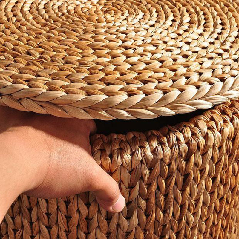 Round natural hand woven footstool on casters with a woven lid