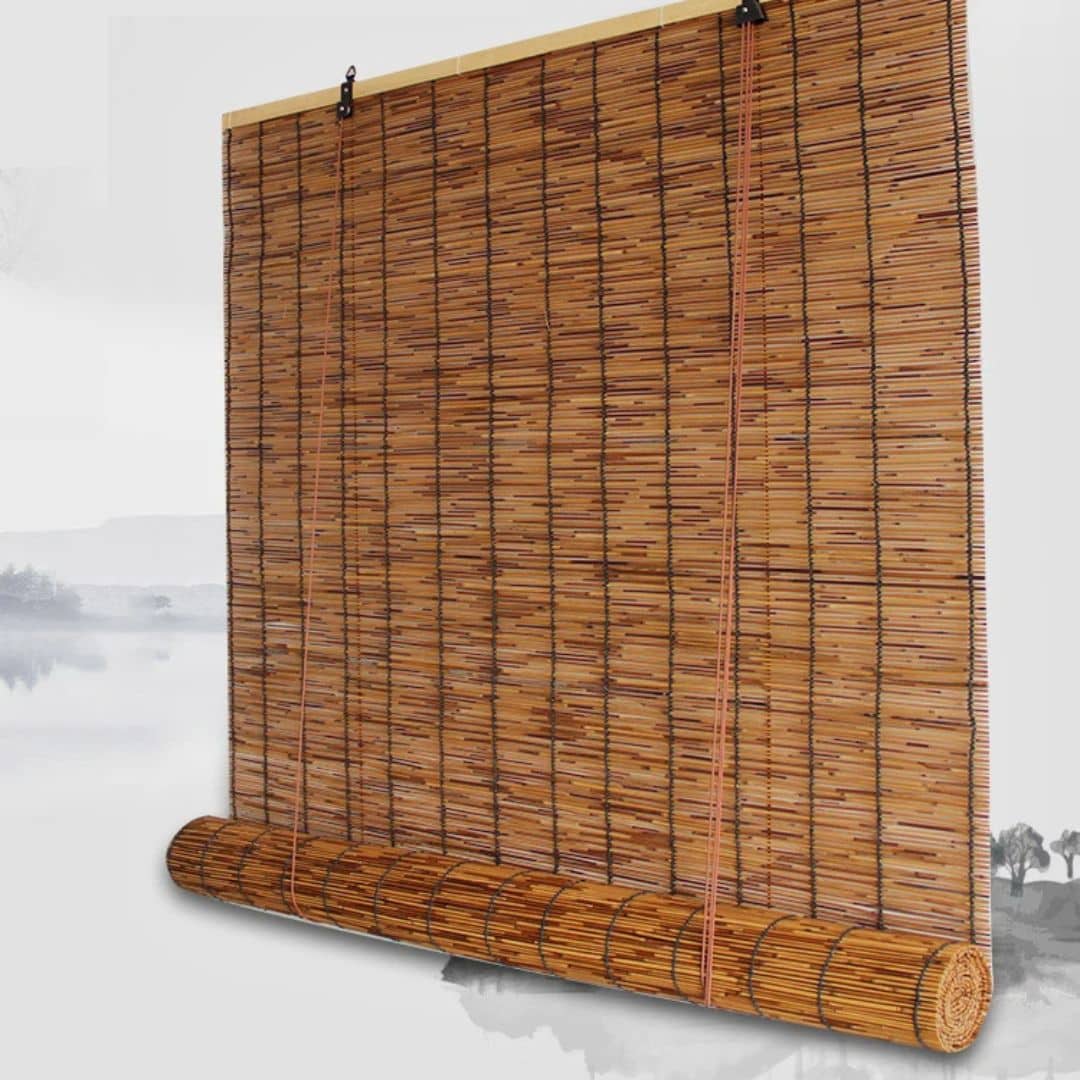Roll up blind made of round natural stems tied with cord, rolled at the bottom