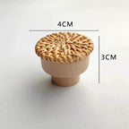Round natural furniture knob with rattan woven around a wooden core