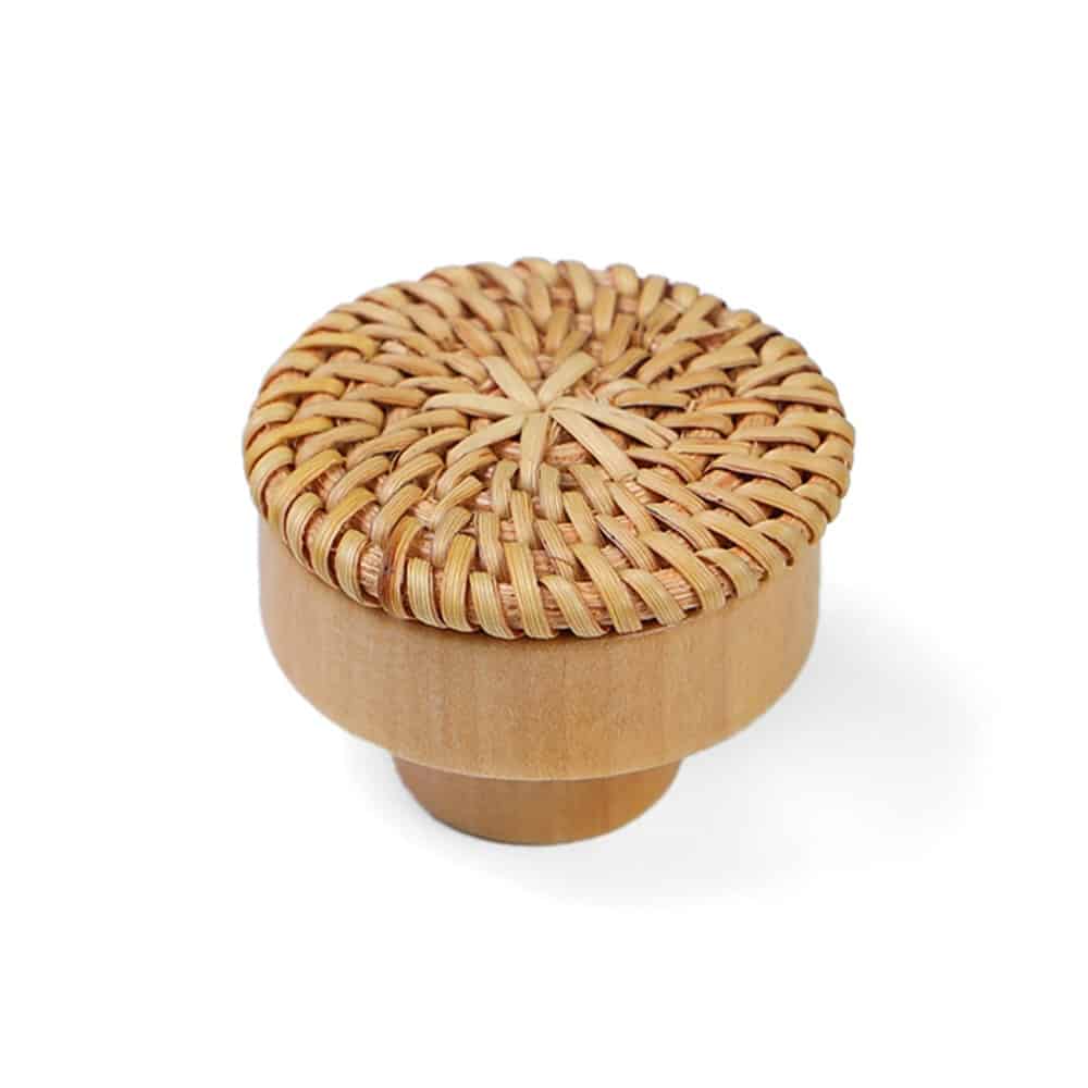 Round natural furniture knob with rattan woven around a wooden core