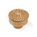Round natural furniture knob with rattan woven around a wooden core
