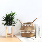 Hand woven natural fiber planter with an openwork lace pattern