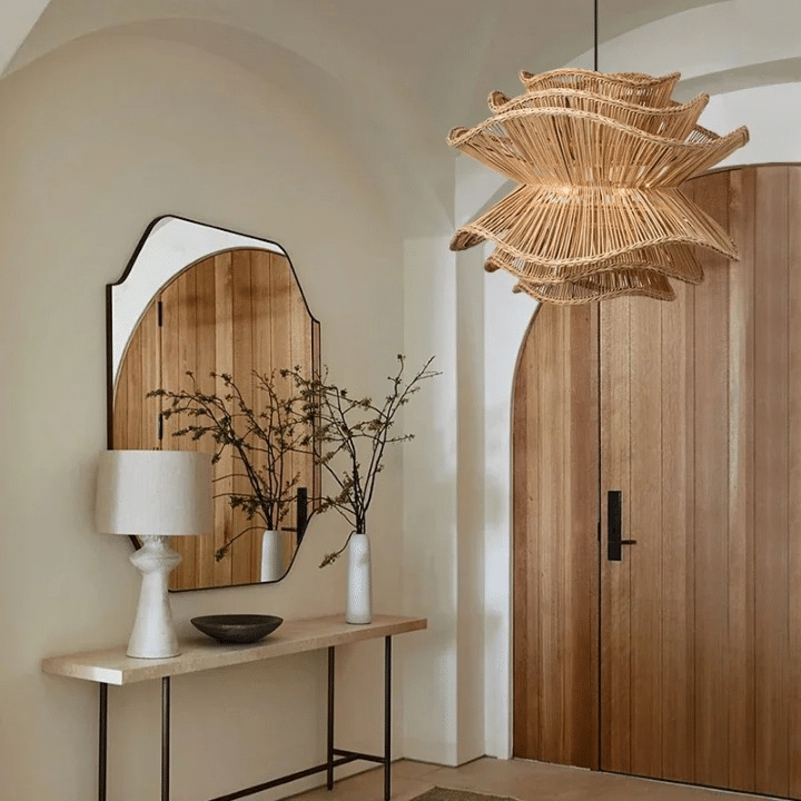 Round minimalist chandelier hand woven in golden brown wicker