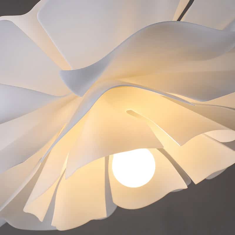 Modern Nordic pendant light with curved white acrylic petals like an opening bud