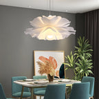 Modern Nordic pendant light with curved white acrylic petals like an opening bud