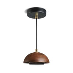 Nordic pendant light in natural wood with an acrylic diffuser