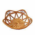 Round openwork rattan basket with decorative loops