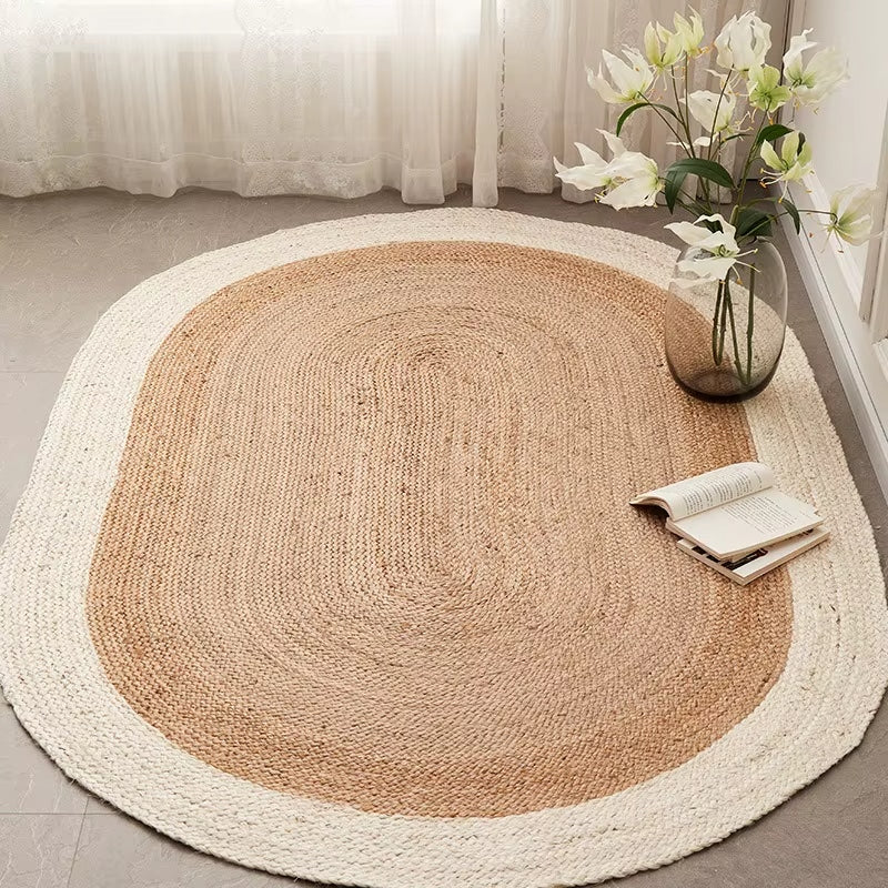 Oval jute rug with a thick cream border