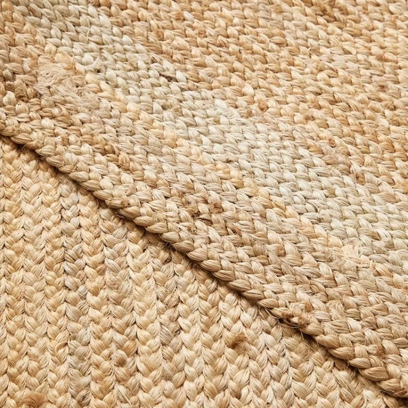Oval jute rug with a thick cream border