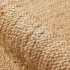Oval jute rug with a thick cream border