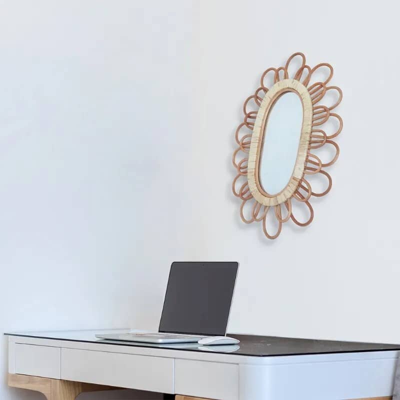 Oval mirror with a rattan frame of petal loops
