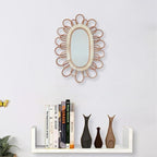 Oval mirror with a rattan frame of petal loops