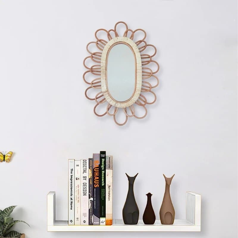 Oval mirror with a rattan frame of petal loops