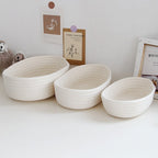 Low oval white cotton rope basket