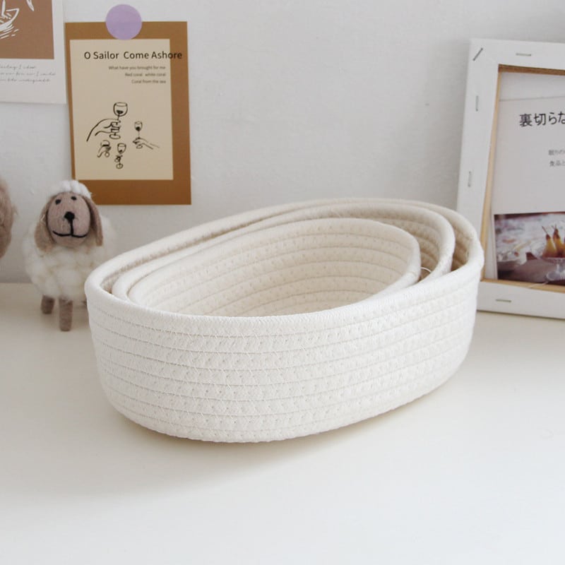 Low oval white cotton rope basket