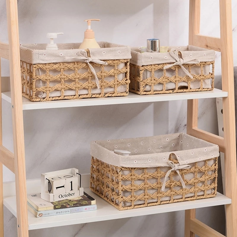 Paper rope storage baskets with fabric liners on open shelves