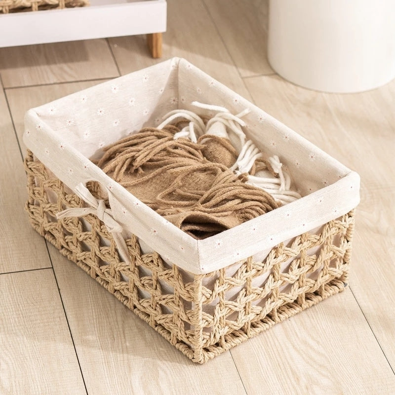 Paper rope storage baskets with fabric liners on open shelves