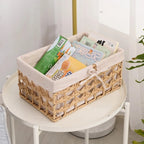 Paper rope storage baskets with fabric liners on open shelves