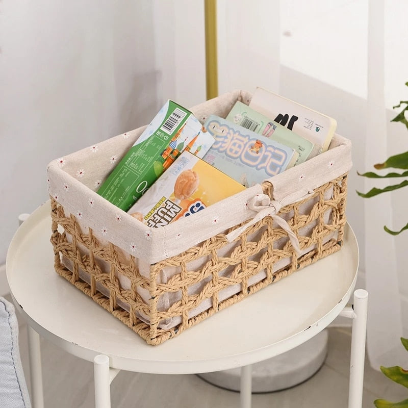 Paper rope storage baskets with fabric liners on open shelves