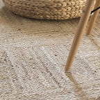 Jute rug with an alternating parquet pattern