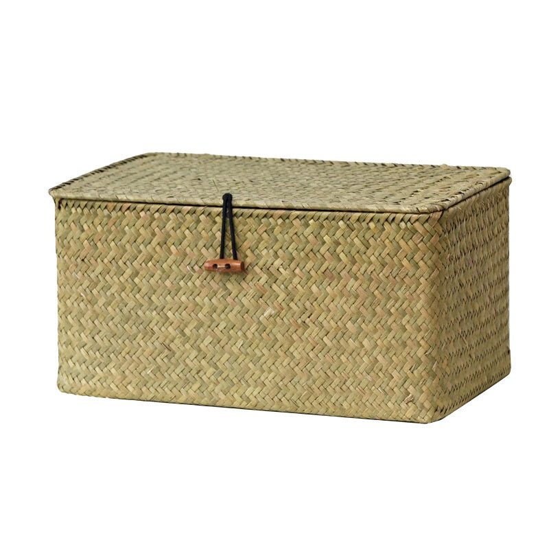 Hand woven patinated rattan trunk box with a lid, offered in three sizes