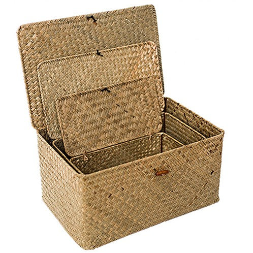 Hand woven patinated rattan trunk box with a lid, offered in three sizes