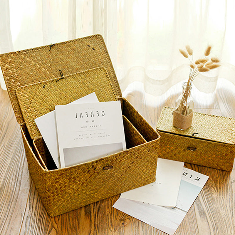 Hand woven patinated rattan trunk box with a lid, offered in three sizes