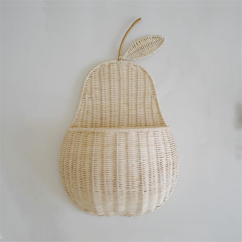 Pear shaped rattan wall baskets in brown and white with plush toys