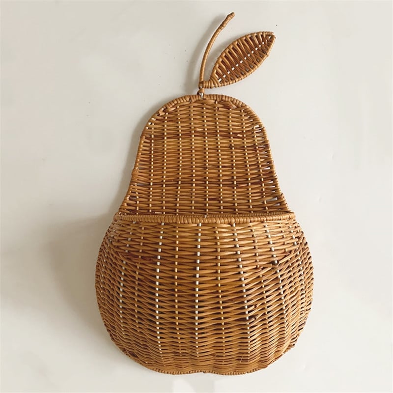 Pear shaped rattan wall baskets in brown and white with plush toys