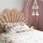 Fan shaped headboard with woven petals in natural beige bamboo