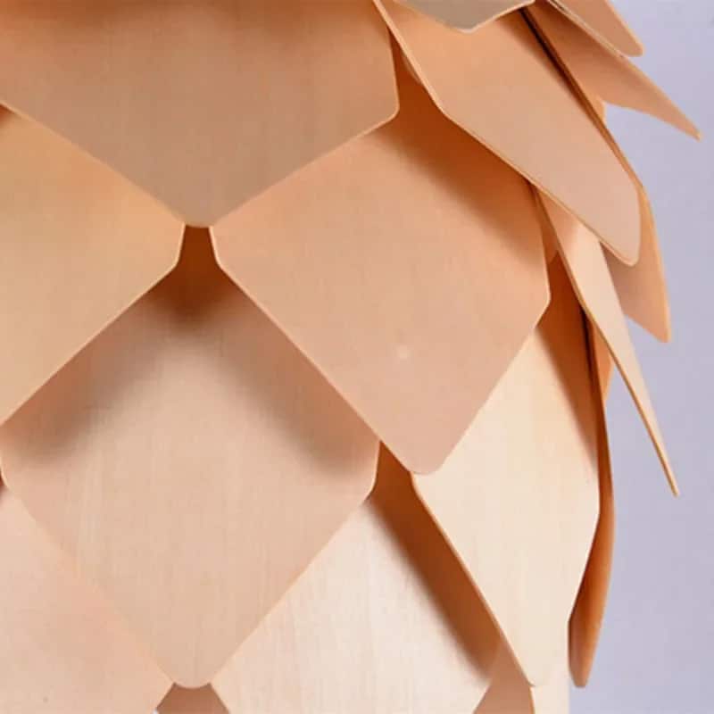 Pine cone shaped pendant light made of layered natural wood scales