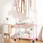 Pink wood look rolling clothes rack with a hanging rail and lower shelf on casters