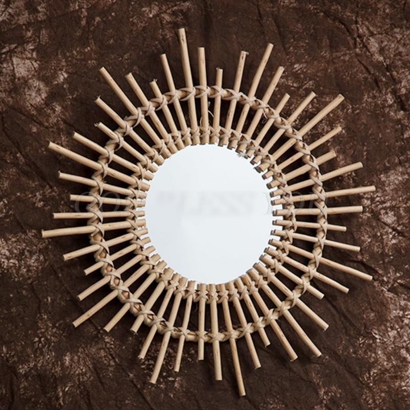 Rattan sun mirror with rays of varying length