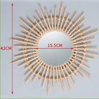 Rattan sun mirror with rays of varying length
