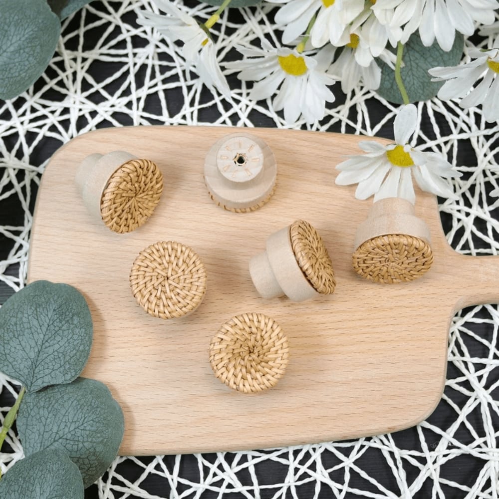 Round furniture knob in woven rattan with a beech wood base