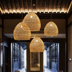 Beehive shaped woven rattan pendant light