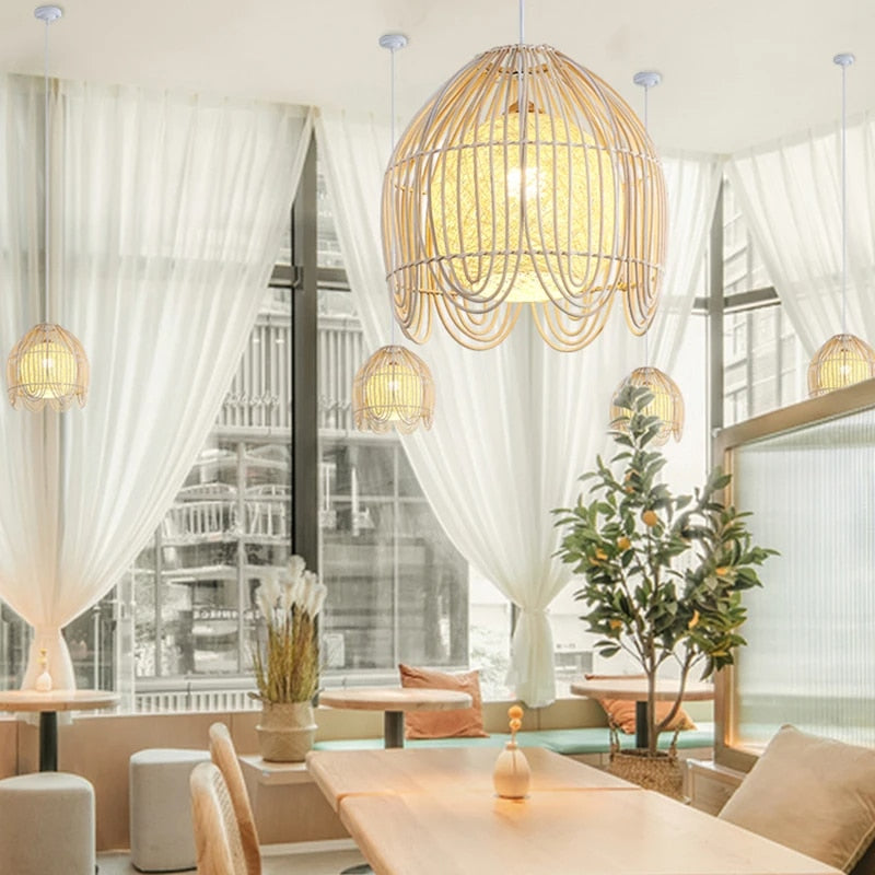 Rattan dome pendant with looped fringe and white inner shade