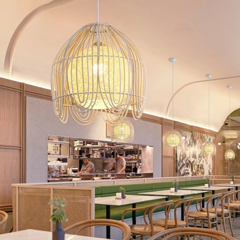 Rattan dome pendant with looped fringe and white inner shade