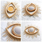 Eye shaped rattan mirrors with sunburst rays