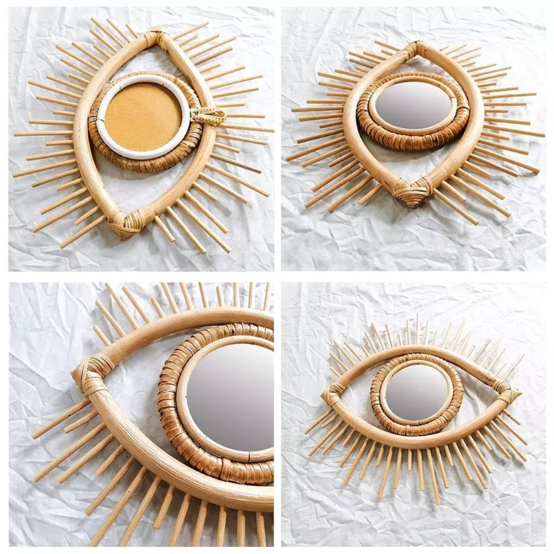 Eye shaped rattan mirrors with sunburst rays